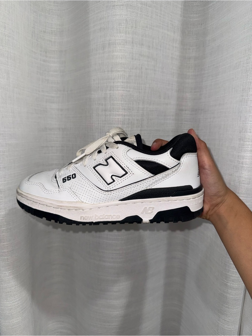 New Balance Women’s 550 Sneakers in White and Black